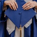 woman holding mortarboard